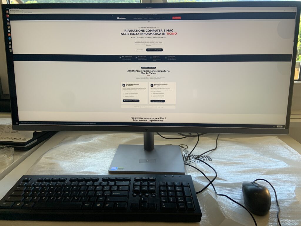 HP All-in-One 34-c1959nz acceso e funzionante dopo la sostituzione della ventola, con la pagina tipicino.ch a schermo, riparazione per un cliente di Giubiasco