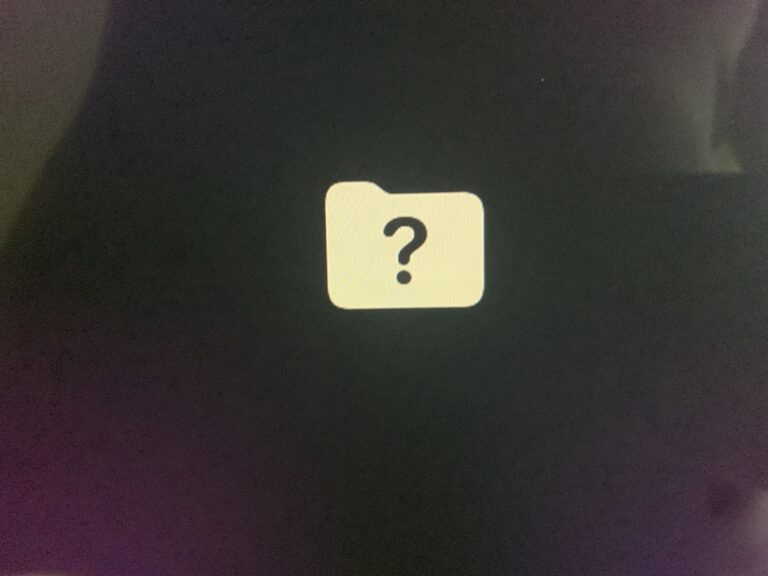 iMac A2115 che mostra la cartella con il punto interrogativo all'avvio, riparazione per un cliente di Morbio Inferiore